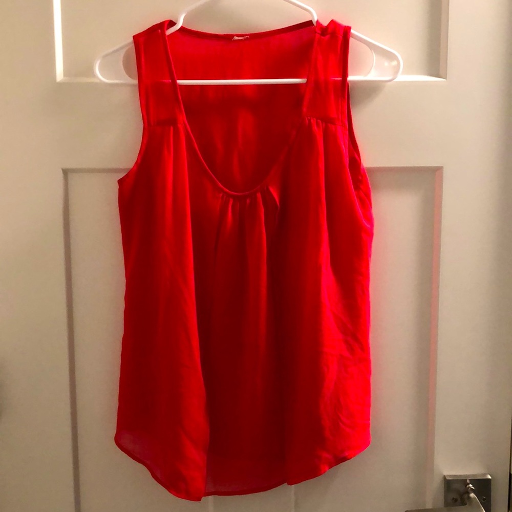 Sleeveless sheer top in dark salmon color